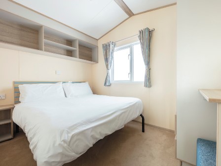 Bedroom in saver caravan at Perran Sands