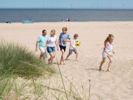 Family at beach near Caister on Sea Holiday Park