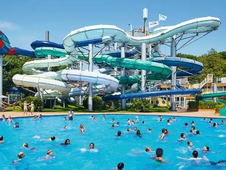 Swimming pool with flumes at Eurocamp Duinrell