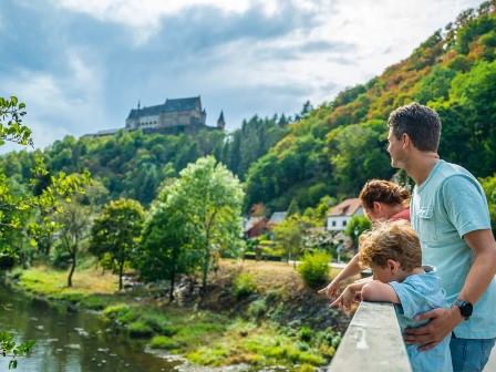 Family at river near Euro Parcs Kohnenhof in Luxembourg