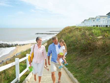 Walking from the beach at Hopton Holiday Village