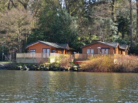 Lodge overlooking lake at Fallbarrow Holiday Park