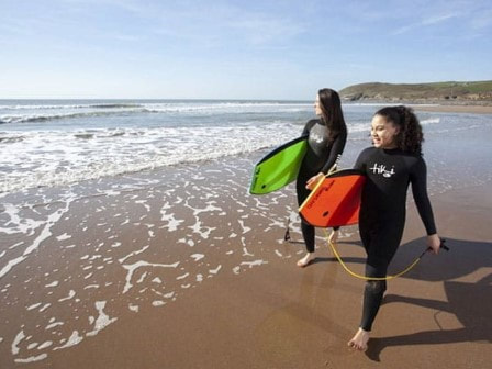 Bodyboarding at Croyde Beach near Ruda Holiday Park