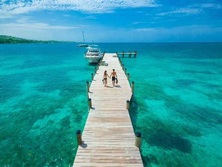 Couple on pontoon at Sandals South Coast