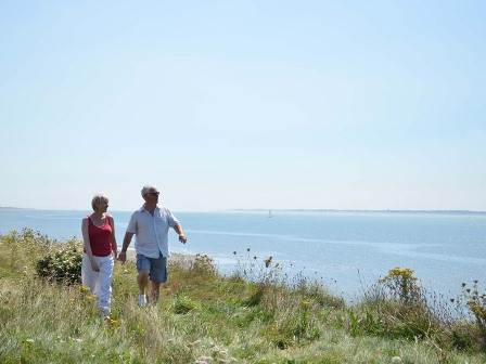 Couple walking near Solent Breezes Holiday Park