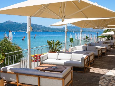 Neilson Vounaki Beach Bar with watersports in background