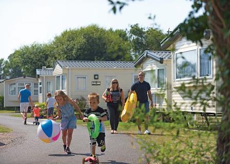 Family at caravans at Bunn Leisure West Sands